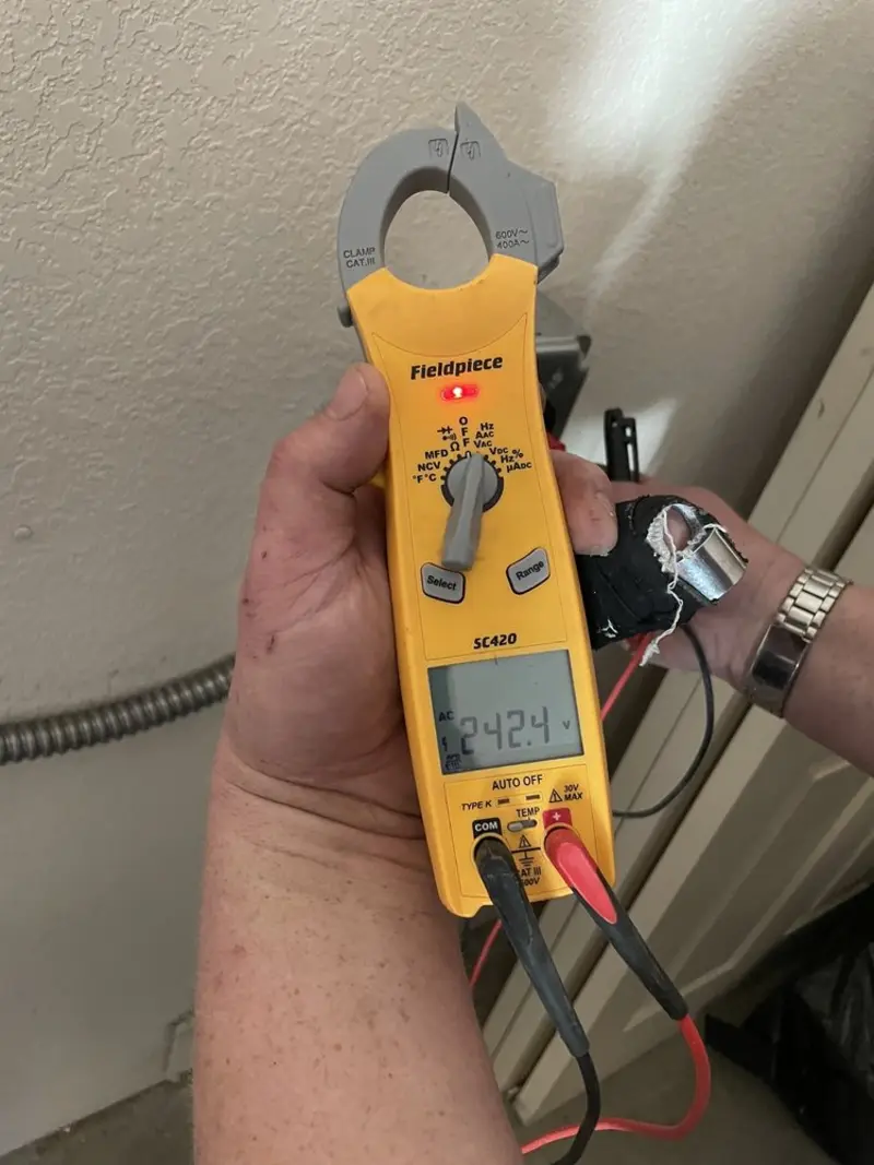 Voltage testing with clamp meter during Circuit Breaker Repair in Warren